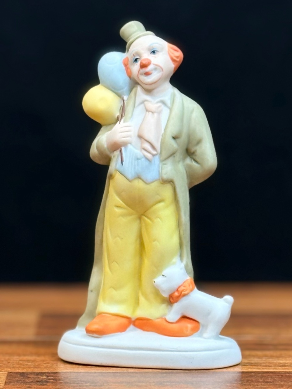 Clown with Balloons and Dog Figurine